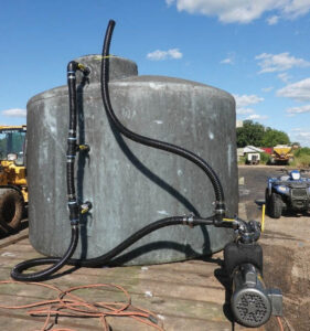 This manure aeration tank, onsite at a beef cattle farm, treats manure to separate phosphorus from the liquid portion, similar to how a wastewater treatment plant operates.